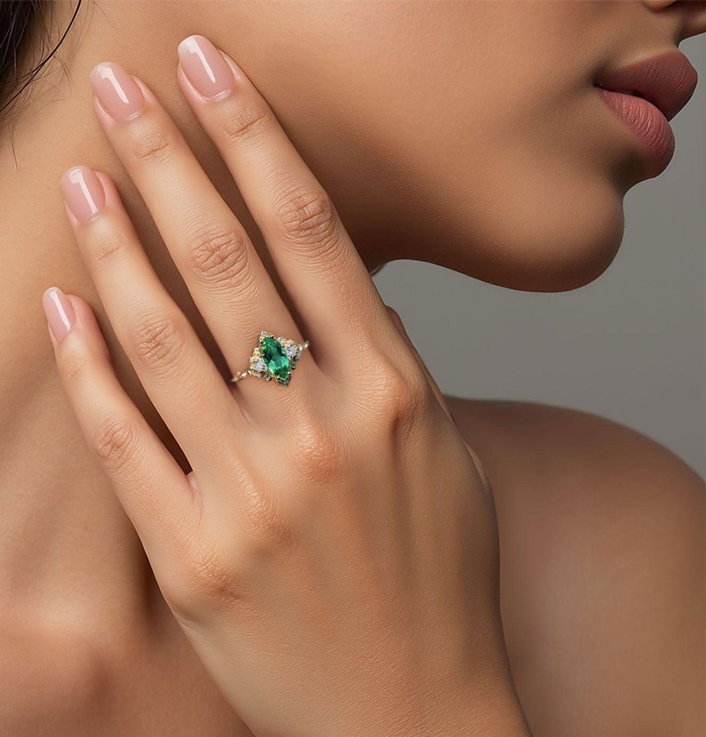 Emerald Moissanite Statement Ring in Gold Finish – 10×5mm Center Stone, Elegant Three-Stone Design